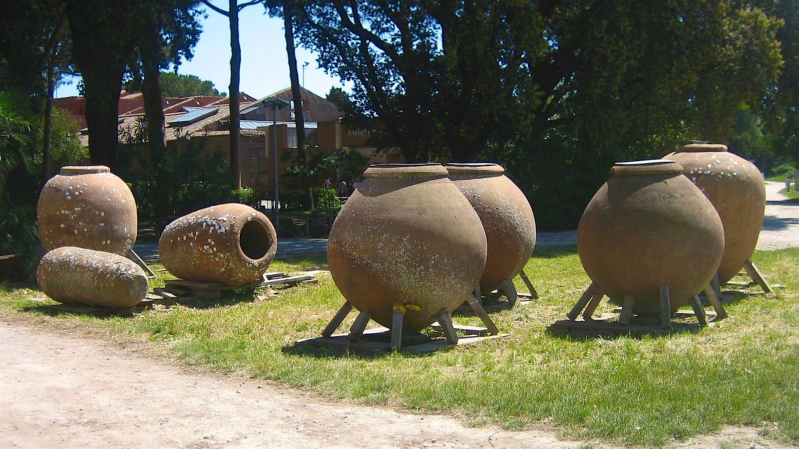 Large clay vessels, called dolia, found in the ancient Roman city of Ostia Antica.